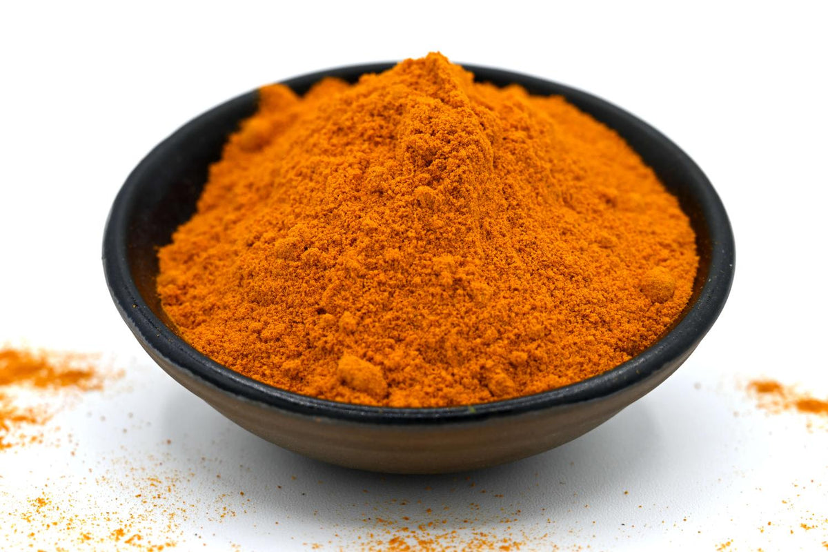 Bol noir contenant Curcuma d’Inde