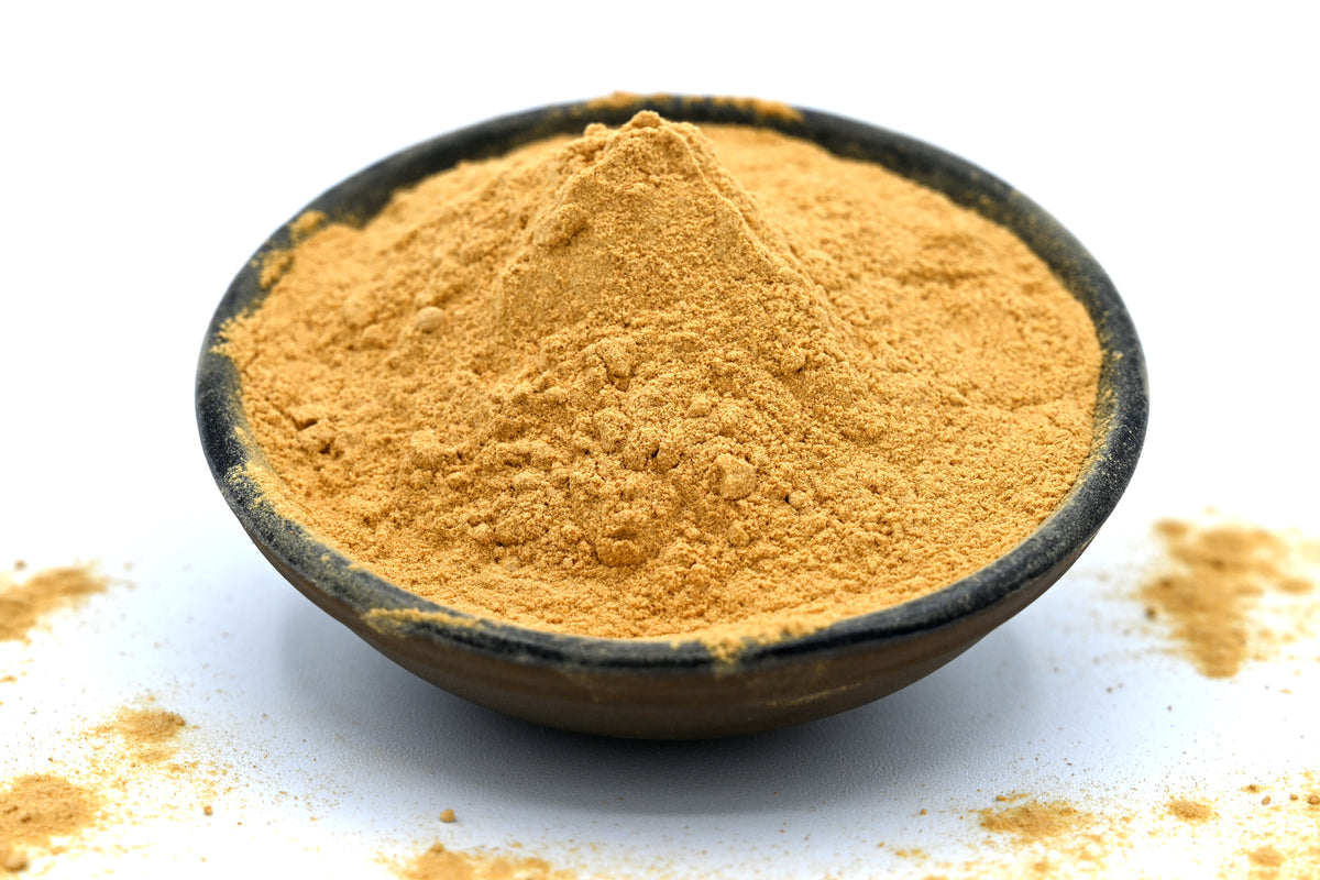 Bol noir contenant Gingembre citronné pour la cuisine